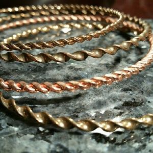 4 bangles copper and brass color. Lowest price today